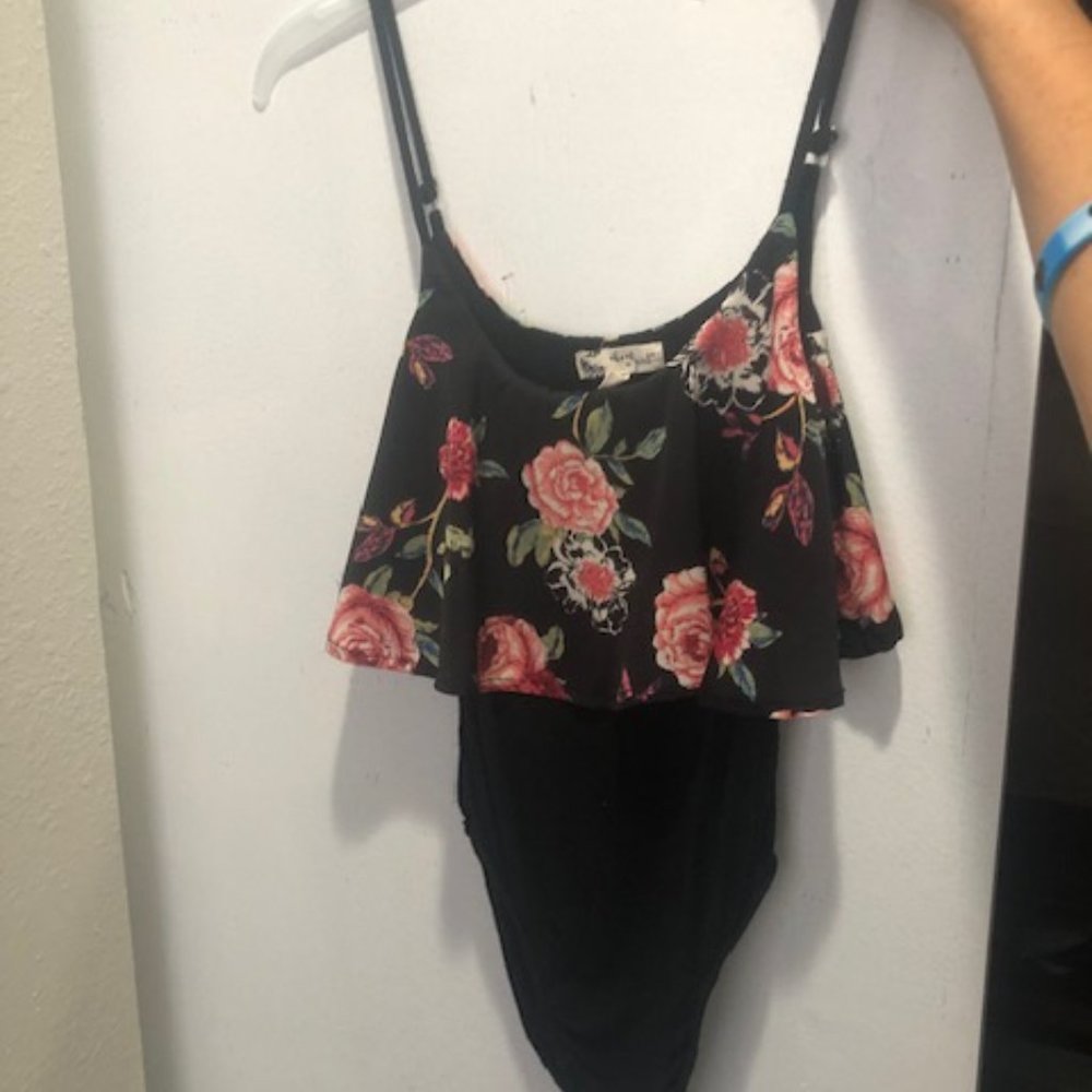About A Girl Flower and Black bodysuit